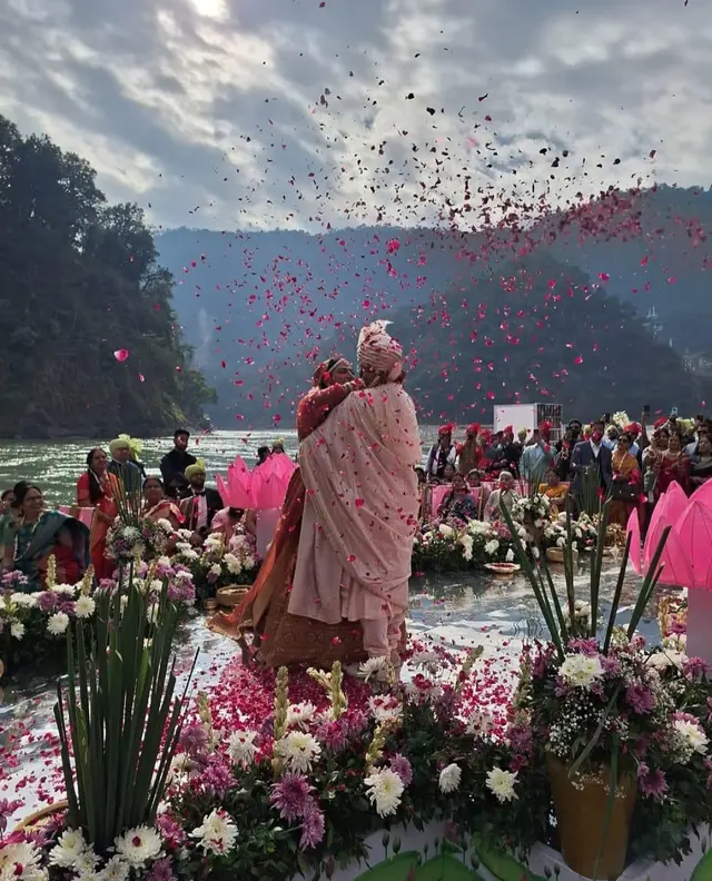 Destination wedding ceremony with river backdrop